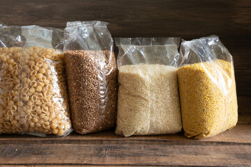 Food in a package on a wooden background. Foodstock concept