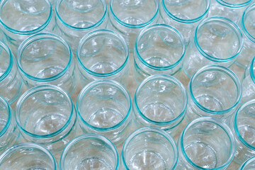 glass jar empty glasses row for jam honey with lid caps abstract background