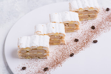 delicious cake on a white plate, top view