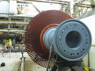 Power generator steam turbine in repair process, machinery, pipes, tubes at power plant