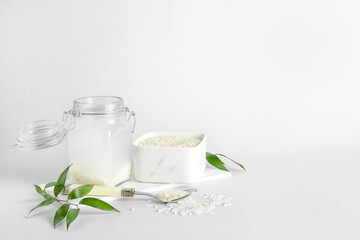 Jar of rice water on white background