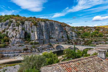The bridge over the river Ardeche near the old village Balazuc in France