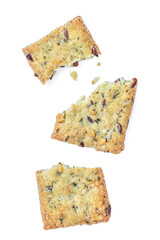 Salted crispy crackers with sesame, rosemary and sunflower seeds isolated on white background. Top view. Flat lay