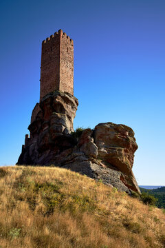 beautiful view of the tower and rock of the castle of zafra in vertical in the province of guadalajara in spain