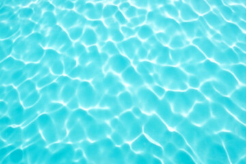 Top view of emerald water surface background in sunlight at daytime.  Sea ocean water texture....