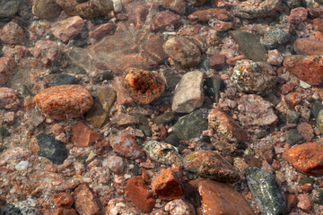 Red Sand and Stones of the red Sea Coast, Natural Texture Background