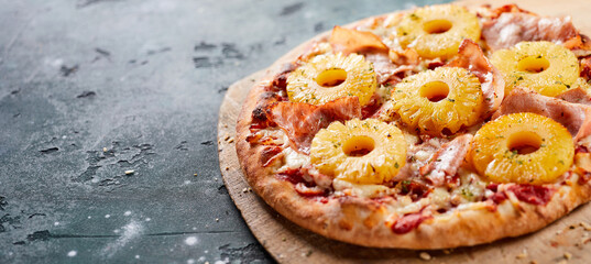 Tropical Hawaiian pizza with pineapple slices - 366219934
