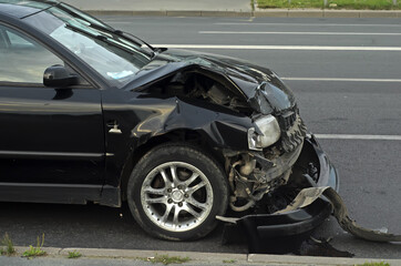 The front part of the car that was broken in the accident on highway