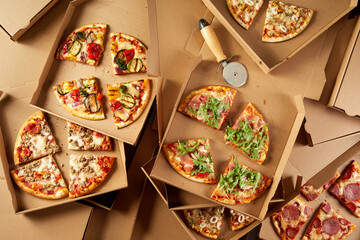 Large assortment of toppings on Italian pizzas