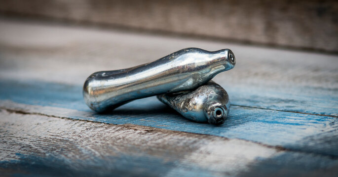 Used Nitrous Oxide Bulbs, Also known as Laughing Gas, It is used as a recreational drug