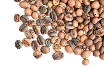 Roasted coffee beans placed on a white background