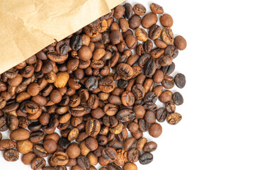 Roasted coffee beans in a brown paper bag placed on a white background