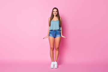 Fototapeta na wymiar Full length body size view of her she nice attractive lovely charming pretty winsome fascinating gorgeous cheerful cheery brown-haired girl standing posing isolated over pink pastel color background