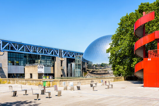 Paris, France - June 22, 2020: General view of the Cite des Sciences et de l'Industrie building, the largest science museum in Europe, with La Geode spheric theater located in the Parc de la Villette.