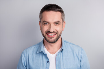 Fototapeta premium Close-up portrait of his he nice attractive content successful cheerful cheery guy beaming smile healthy teeth isolated over gray light pastel color background