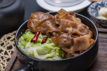 Beef kohlrabi with chicken legs and beef on wooden table