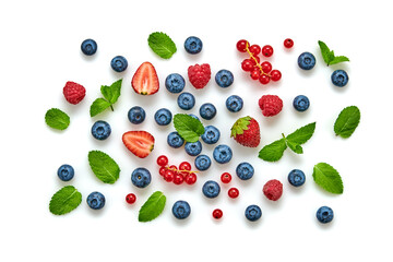 Fototapeta na wymiar Blueberry, raspberry, blackberry, redcurrant, strawberry, cherry isolated on white. Fresh blueberry, berries mix closeup. Red raspberry, blue blackberry, mint creative composition.