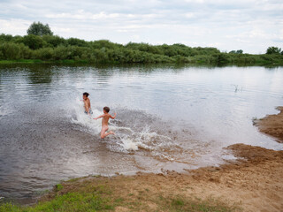 village beach for swimming on a small river