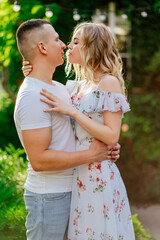 beautiful and happy couple having fun in garden.