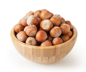 Hazelnuts in wooden bowl isolated on white background with clipping path