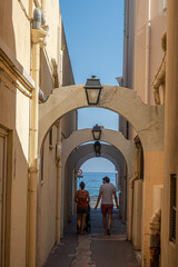 Old town of Menton in France-arcades with lamps