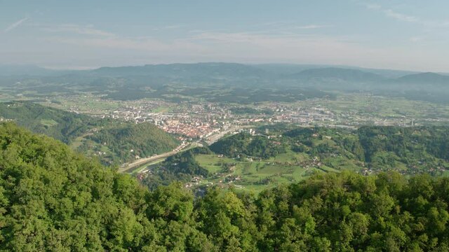 4K Drone Reveal Shot Of Eco Friendly City Surrounded With Greenery
