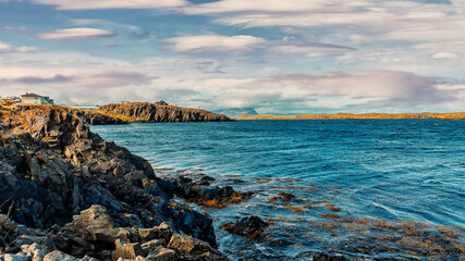 Gorgeous summer seascape of Iceland of sunny day, near Stykkisholmur village. Saefellsnes peninsula. Amazing nature of Iceland. Iconic location for landscape photographers. Picture of wild area.