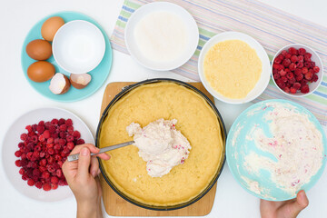 step by step cooking process and ingredients for homemade raspberry pie-egg, cottage cheese, flour, raspberries, sugar, dough, baking dish, butter. top view on a light background. mixing ingredients