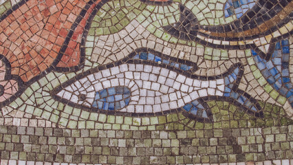 Closeup fragment of ancient religious mosaic, Stone mosaic composition,
