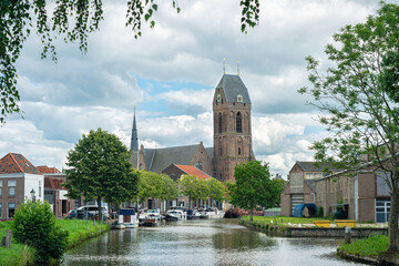 Fototapeta premium View of the old town of Oudewater with Gothic hall church called 