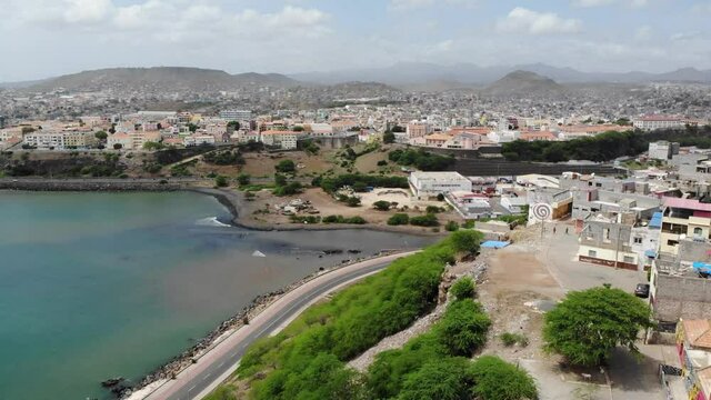 Drone over Achada Grande Frente neighborhood overlooking sea and Praia city