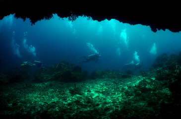 Fototapeta na wymiar underwater cave scuba divers caribbean sea Venezuela 
