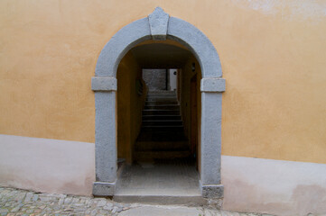 Fototapeta na wymiar Traditional alley entrance taken in the old village of Bigorio, Switzerland