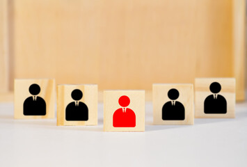 Businessman hand holding wooden cube block with business icons and business idea concept