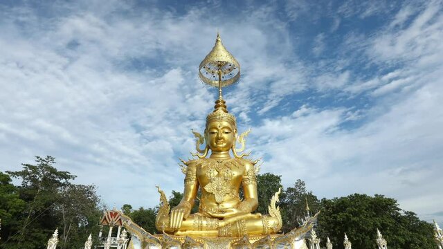 Time-lapse Golden buddha and Beautiful sky