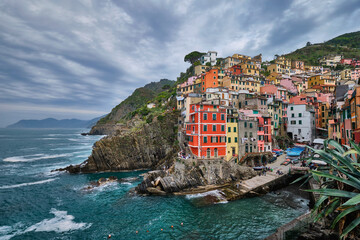 Fototapeta na wymiar Riomaggiore village popular tourist destination in Cinque Terre National Park a UNESCO World Heritage Site, Liguria, Italy in stormy weather