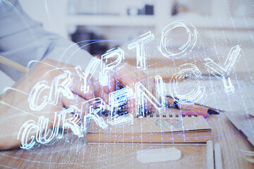 Man's hands working with notes background. Cryptocurrency and finance concept.