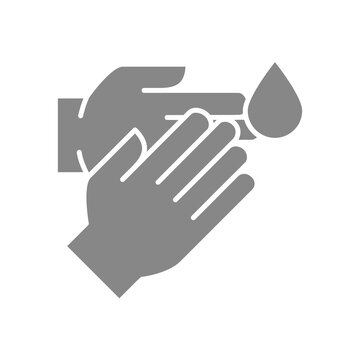 Human hands with disinfectant drop grey icon. Cleaning supply, hand disinfection symbol