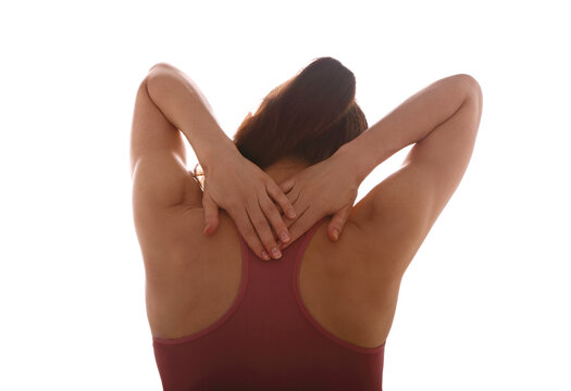 Young strong sporty woman suffering from chronic neck pain. Touching and massaging the hands. Closeup portrait isolated on white background.
