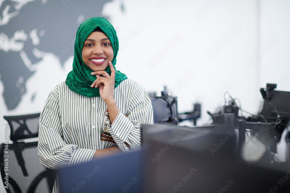 Wall mural portrait of african muslim business woman at office