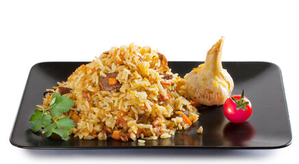 pilaf in dark plate on white background