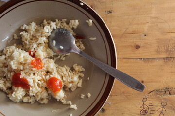 fried rice in plate on table in home