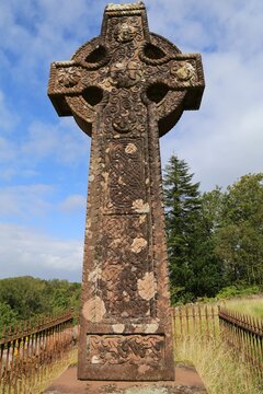 A Celtic cross marking a grave at the abandoned Protestant Christ Church building at Toormakeady, County Mayo, Ireland.