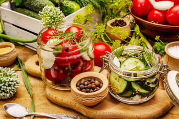 Pickling vegetables concept. Cooking process, spices, fresh fragrant herbs