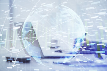 Multi exposure of businessman working on laptop on background. International business hologram in front. Concept of success.