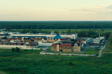 Obraz premium Cozy residential area next to the forest