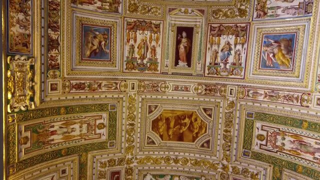 Antique stucco molding and paintings on the walls of an Italian dov. Wall decoration inside Italian palaces