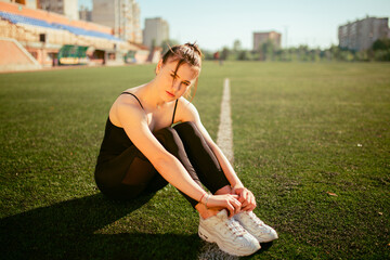 girl in black sport outfit doing doing gymnastics © Bogdan