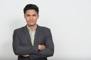 Portrait of handsome Asian businessman in suit