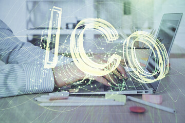 Blockchain theme hud with businessman working on computer on background. Concept of crypto chain....